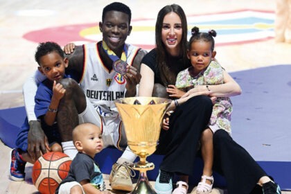 Celebration with trophy and family