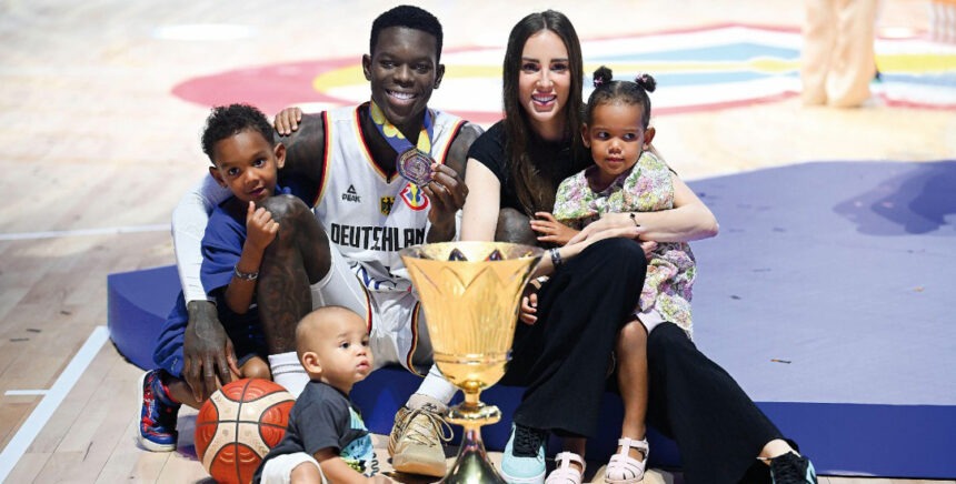 Celebration with trophy and family