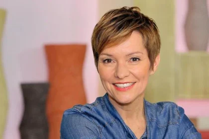 Person with short hair, casual attire.