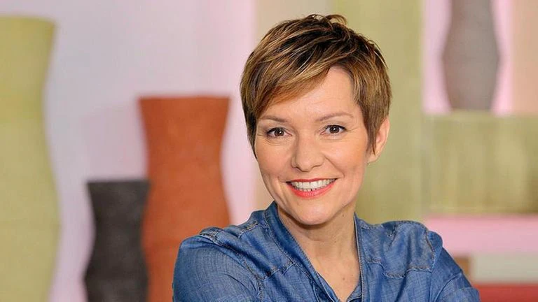 Person with short hair, casual attire.