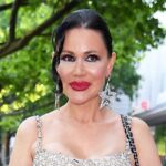 Elegant woman in sparkling dress.